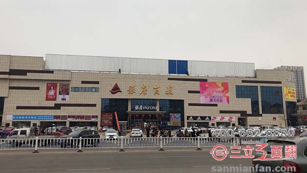 山東泰安市銀座商場(chǎng)樓頂三面翻大型廣告牌案例施工圖片